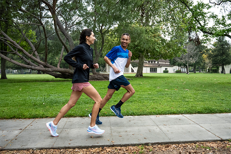 Two Runners Running in the Park